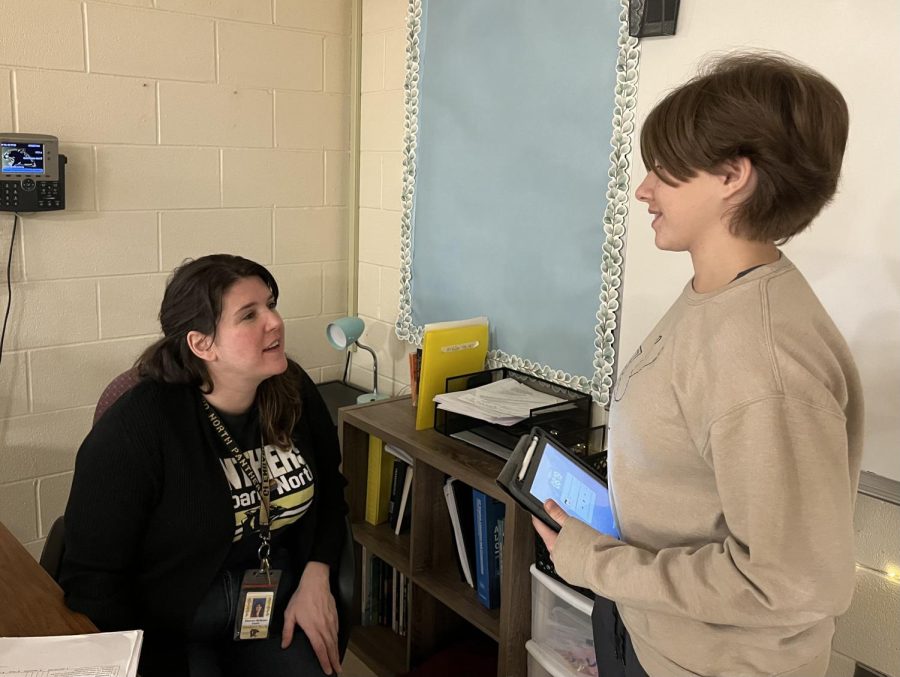 Rhye Nelson, 23, gets academic help from Ms. McMullen, English Teacher